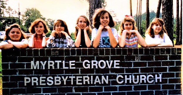 girls by old sign cropped